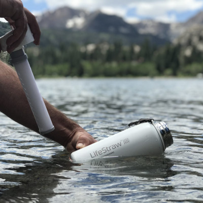 LifeStraw Go Stainless Steel - white - lifestyle - filling up - lake - mammoth - Tara - unlimited